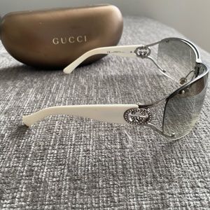 Gucci Sunglasses with crystal logo.